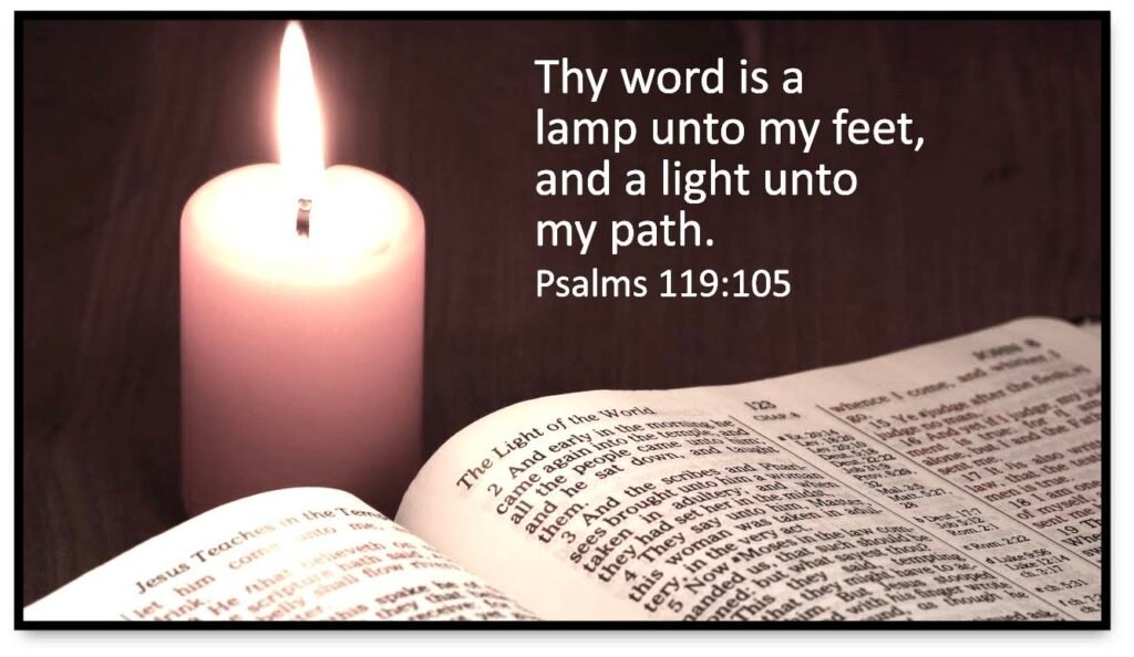 Open Bible and Candle